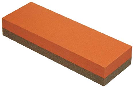 Aluminum oxide stone with rough and semi-smooth sides for stoning a table.