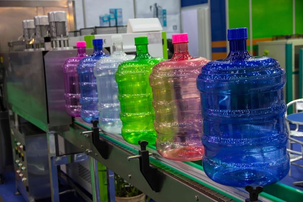 Extrusion blow molding machine water jugs show how large of an object extrusion molding machines can make.