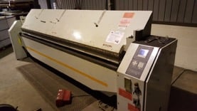 A photo of a metal folding machine