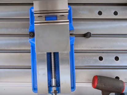 Tap vise to bring indicator to zero